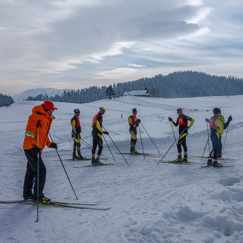 Skiers enjoying winter sports on the snowy slopes of Gulmarg.jpg