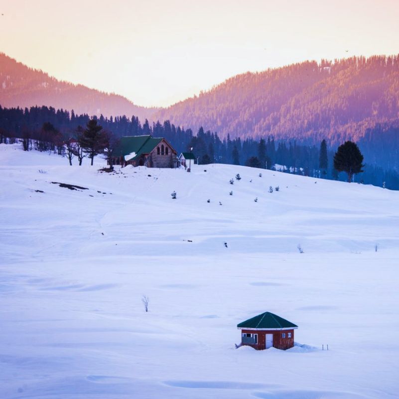Travellers exploring Gulmarg during a Kashmir winter holiday.jpg