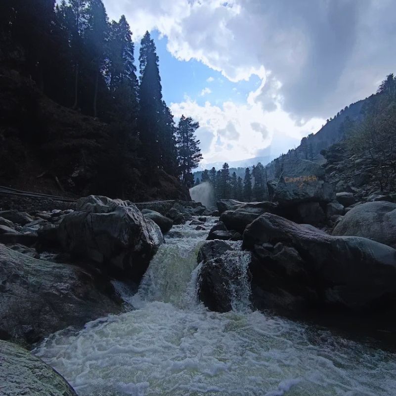 Drung Waterfall covered in ice during the winter season in Kashmir.jpg