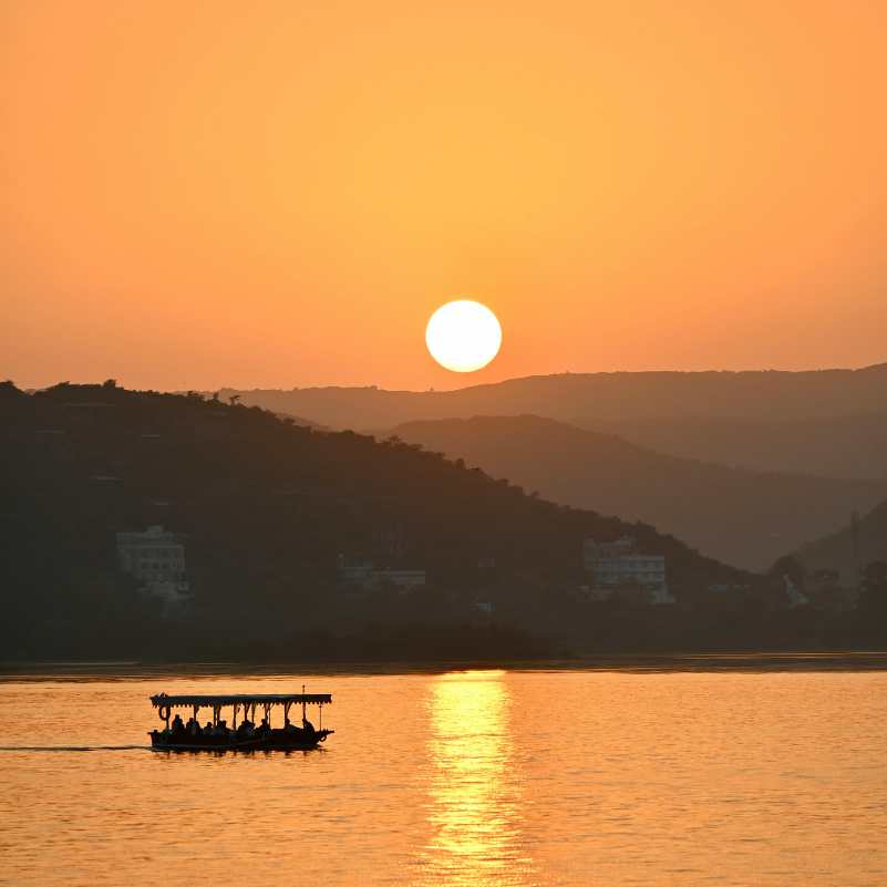Sunset boat ride on Lake Pichola in Udaipur.jpg