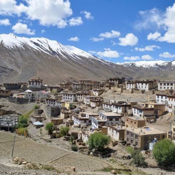 Stone houses and prayer flags at Kibber village in Spiti