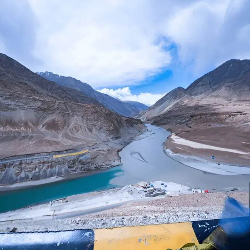Wide panoramic view of Sangam Point showing the two rivers meeting near Nimmo village