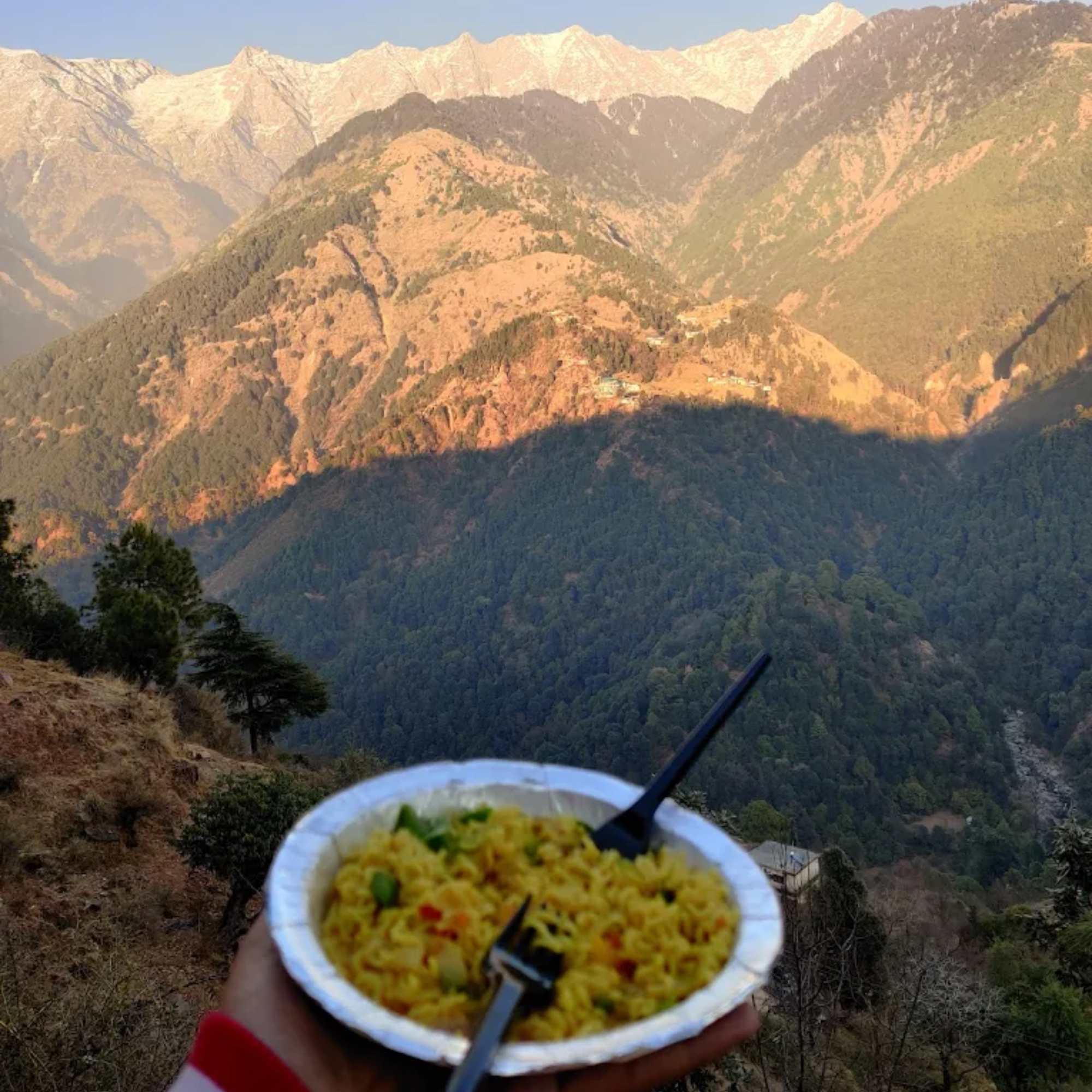 Tourists enjoying mountain views at Naddi Viewpoint in Himachal Pradesh.jpg