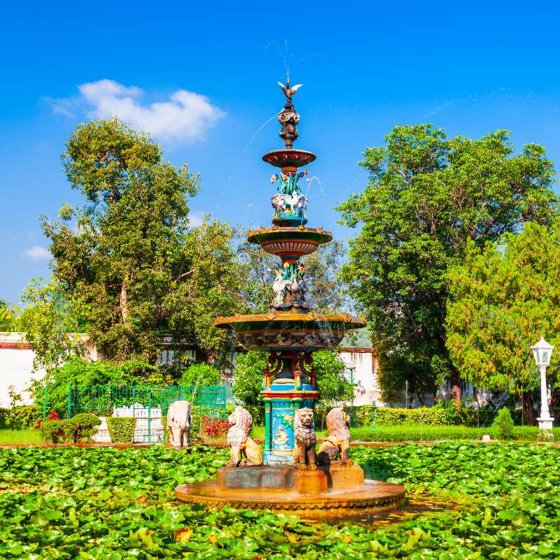 Green lawns and flowering plants at Saheliyon Ki Bari.jpg