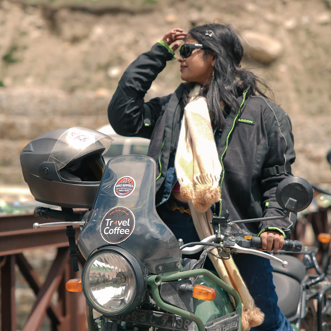 Female traveller on Royal Enfield during Travel Coffee Spiti Valley bike trip.jpg.jpeg