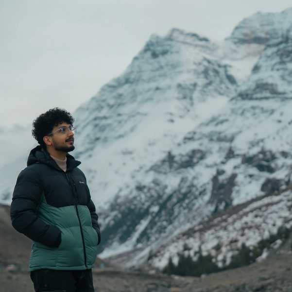 Sissu Valley in April with late snow on the ground and the Lahaul mountains rising behind the village