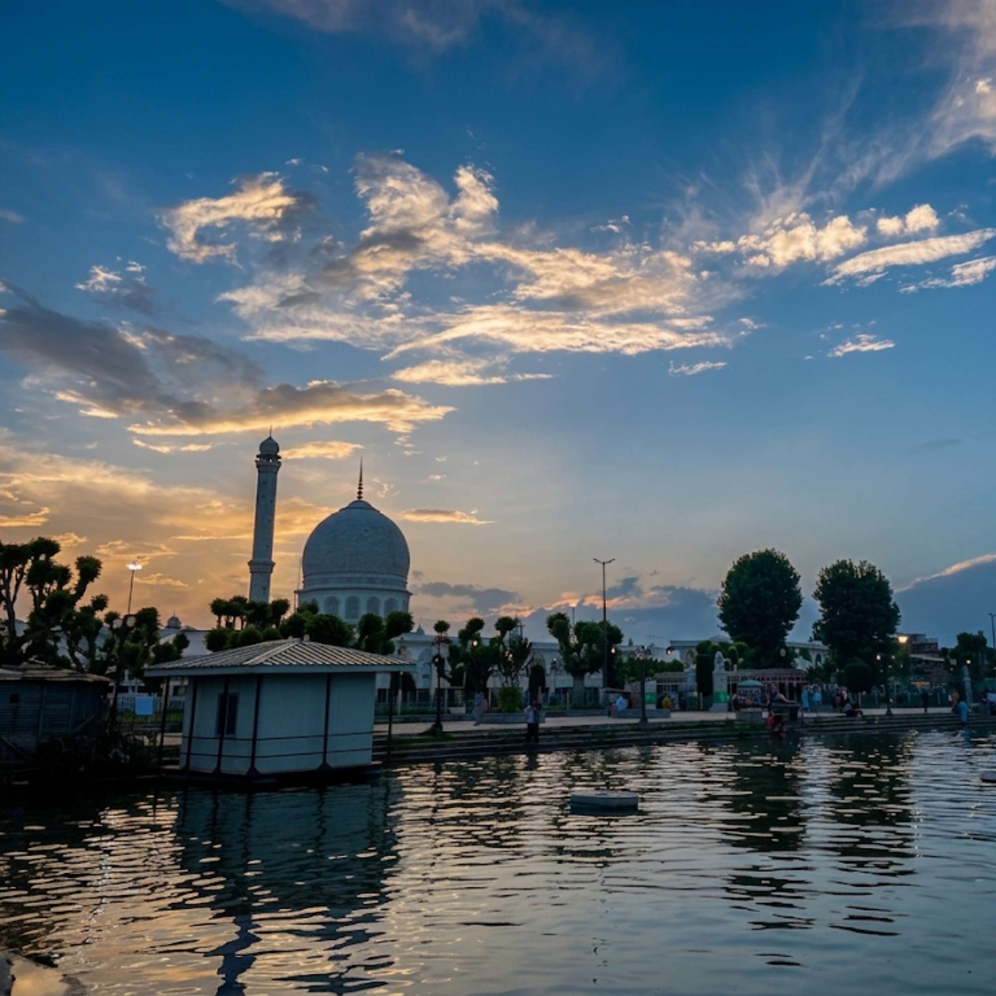 Hazratbal Shrine at sunset with Dal Lake in the foreground