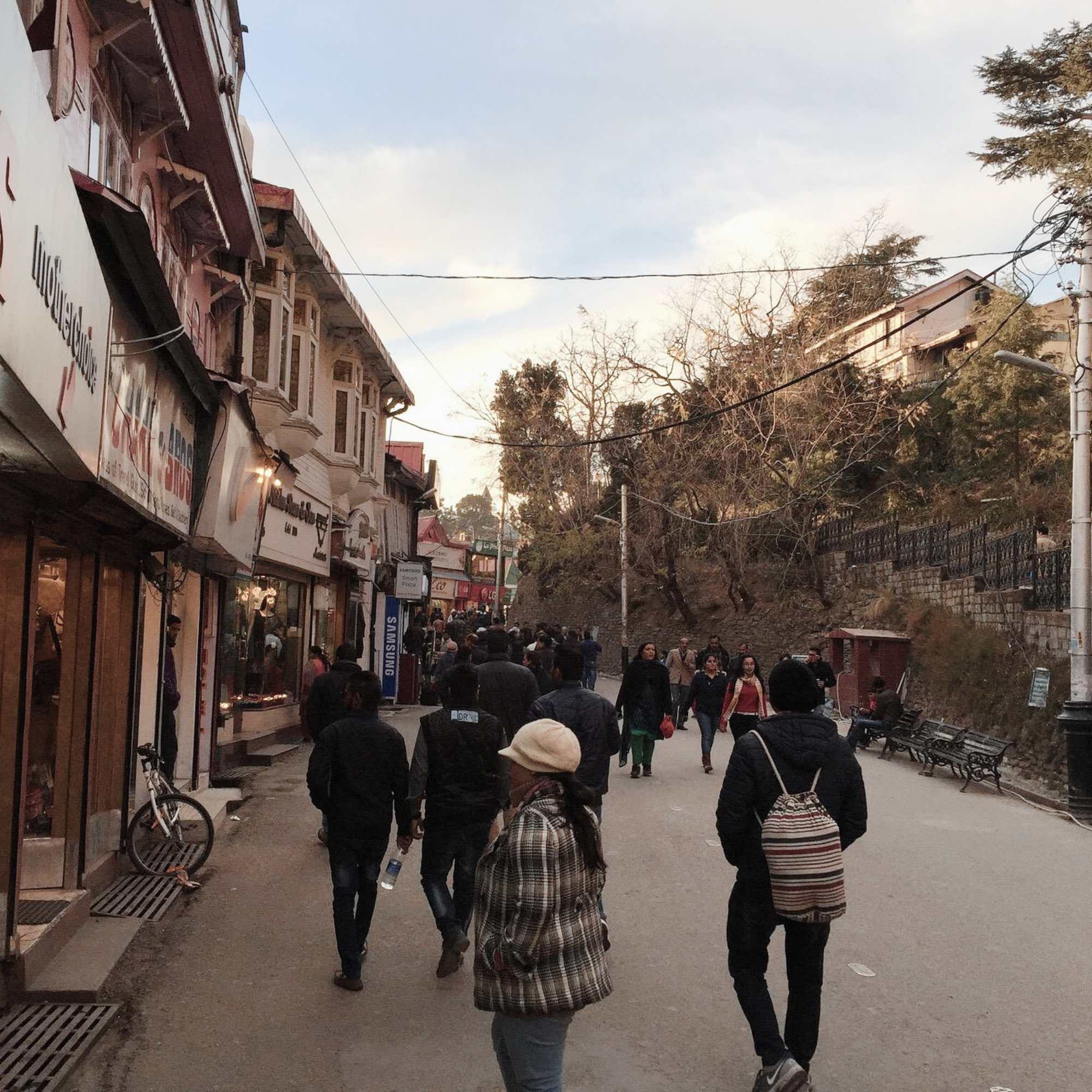 Vibrant shopping street at Mall Road Shimla with local stores.jpg