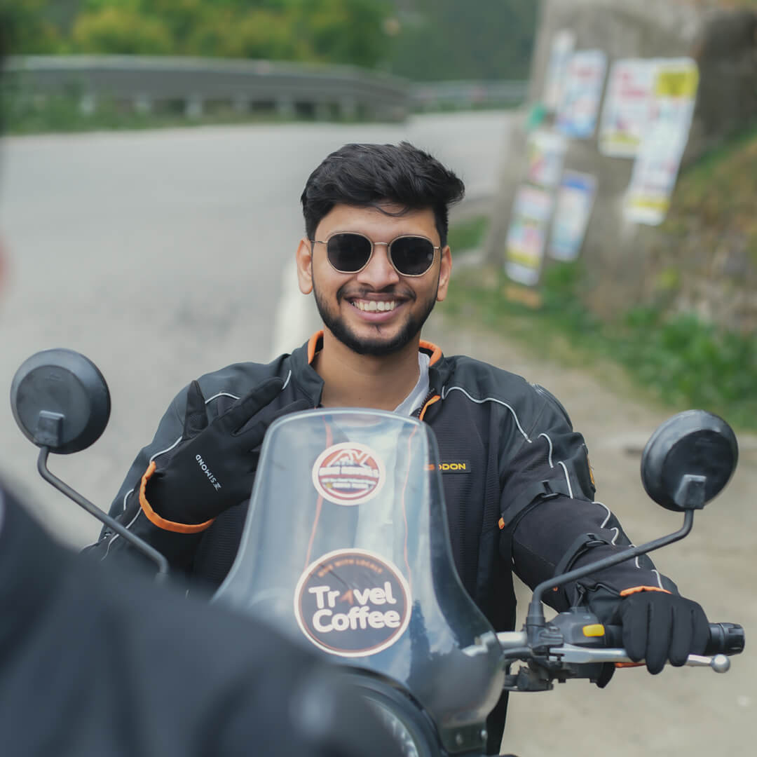 Smiling rider on Travel Coffee bike during a Spiti Valley bike trip.jpg.jpeg