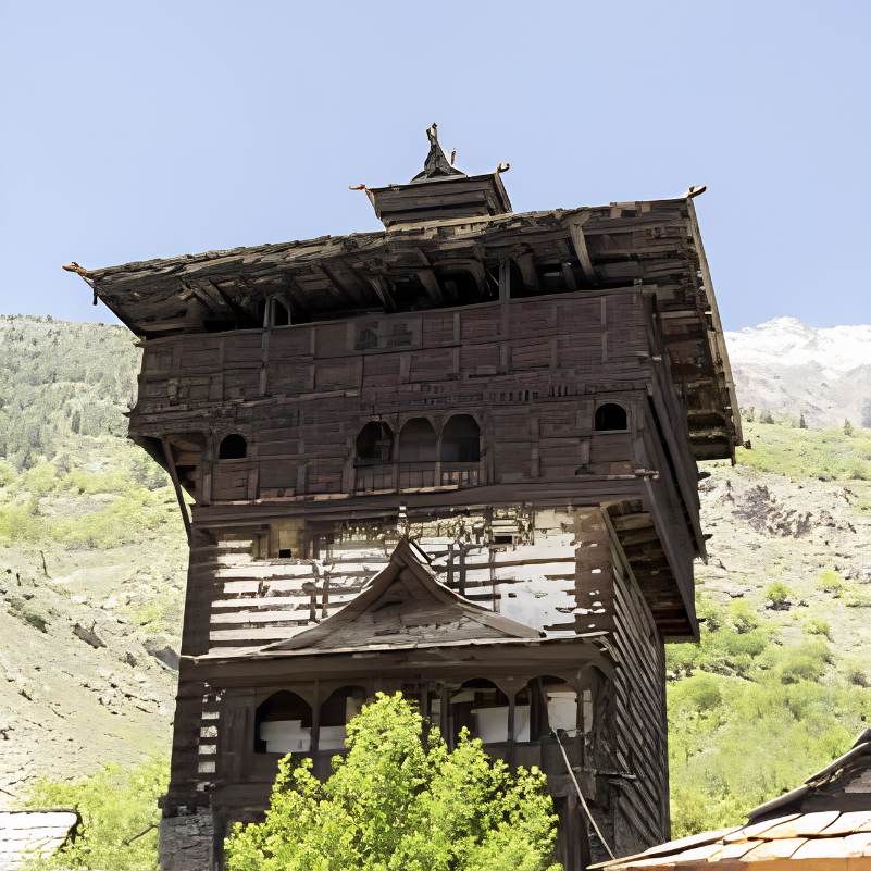 Kamru Fort tower with prayer flags in Kinnaur