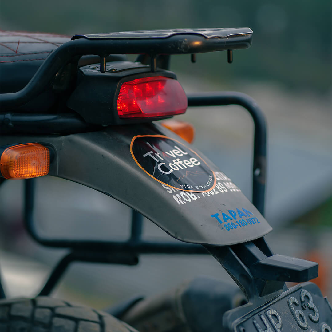 Travel Coffee sticker on Royal Enfield bike during Himalayan bike trip.jpg.jpeg