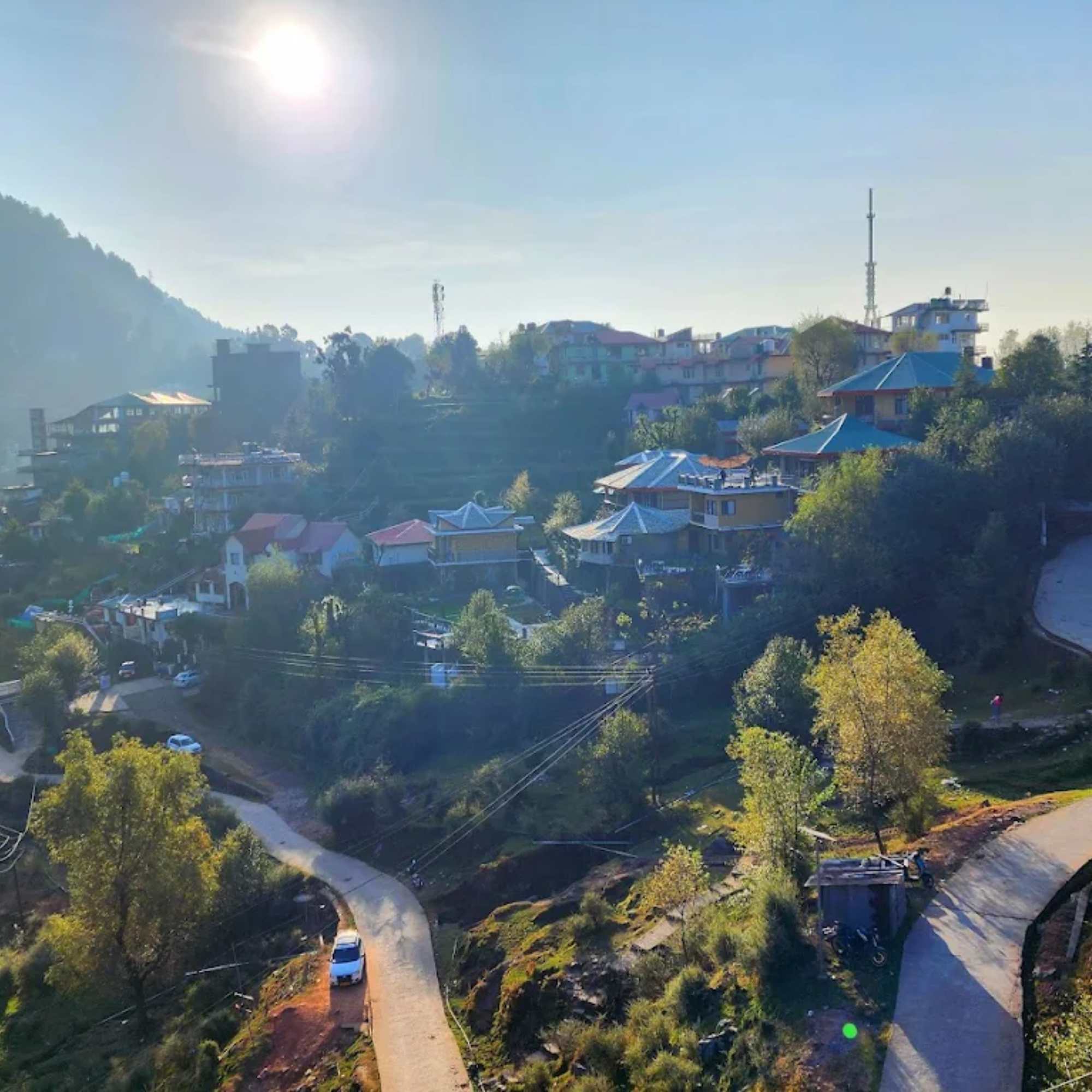 Wide angle view of mountains and valleys from Naddi Viewpoint.jpg