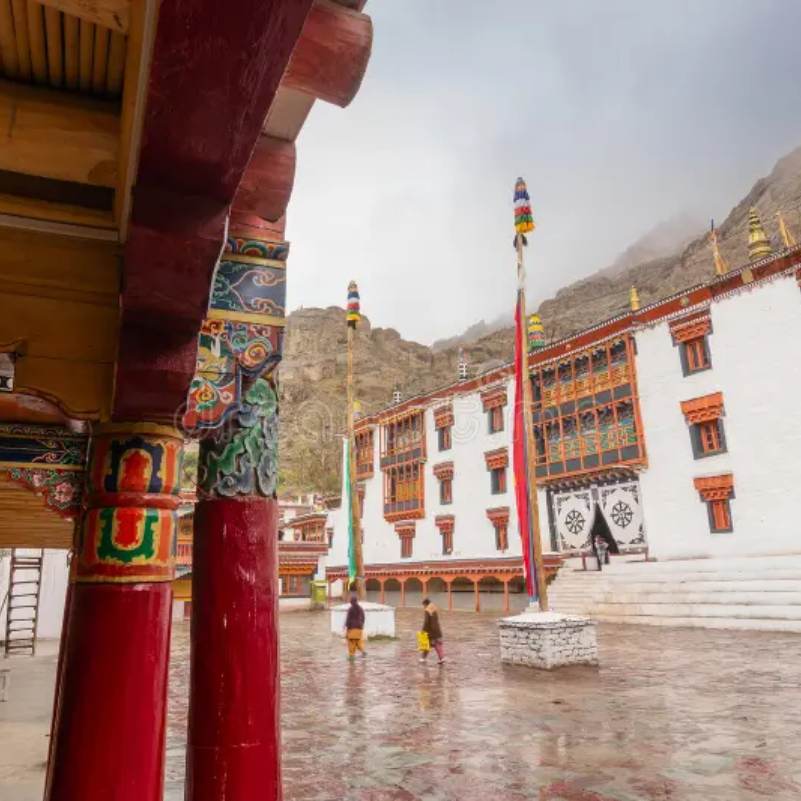 Whitewashed walls and colourful balconies of Hemis Monastery under a clear Ladakh sky