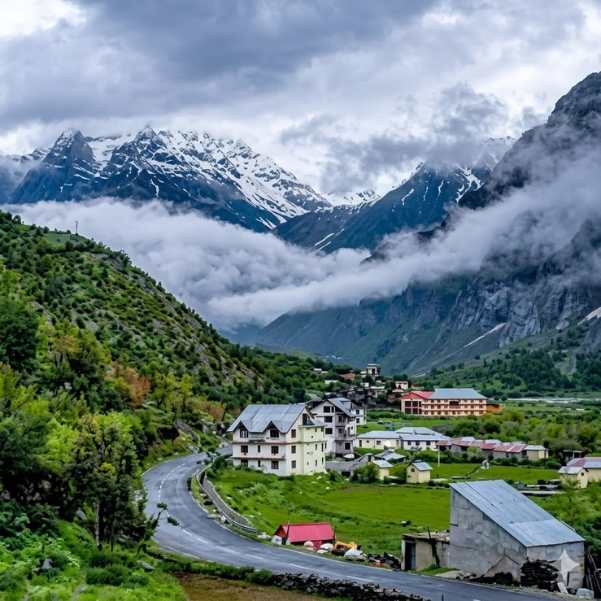 Jispa Village in the Lahaul valley with mountains and the Bhaga river