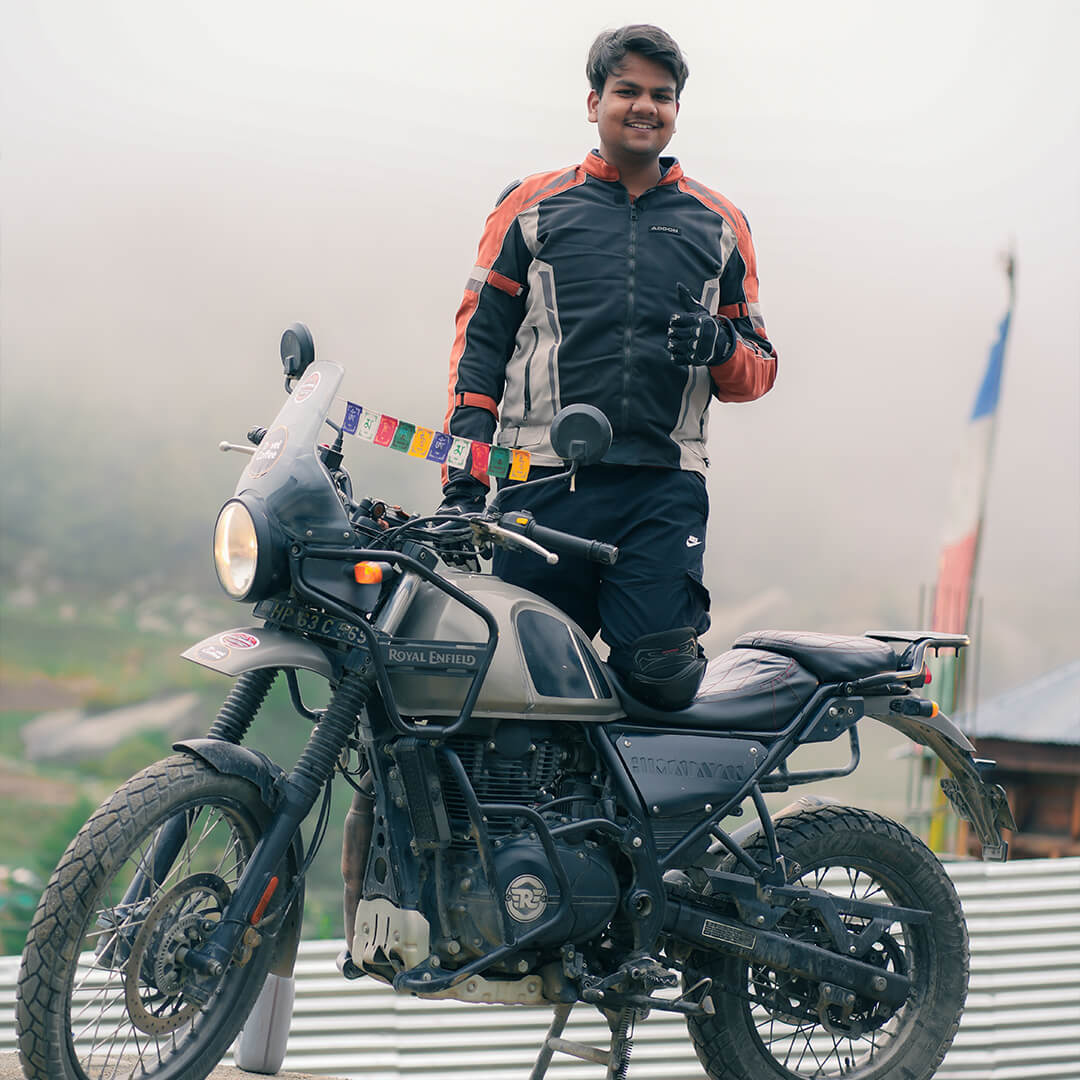 Rider posing with Royal Enfield during a Spiti Valley bike trip.jpg.jpeg
