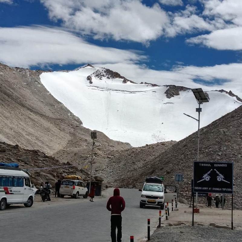 Snow covered road approaching Chang La Pass in Ladakh