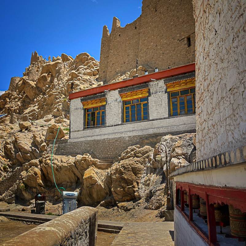 Hilltop view of Shey Palace with the dry ridges of the Ladakh range in the background
