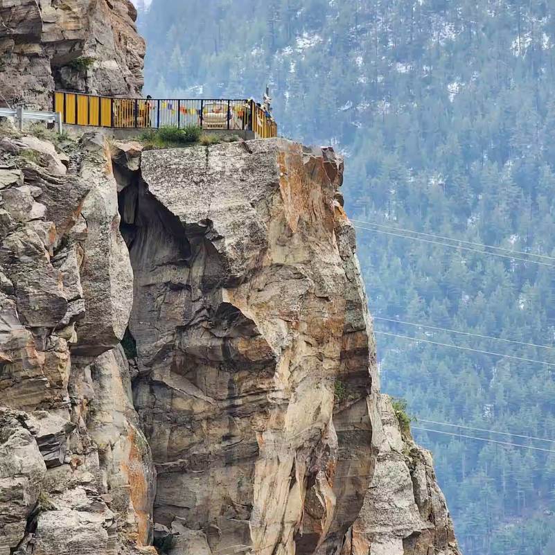 Rugged hills and greenery around Suicide Point near Kalpa