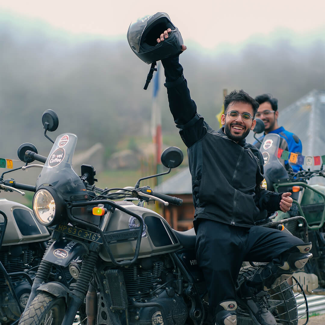 Travel Coffee rider celebrating during a Spiti Valley bike trip.jpg.jpeg