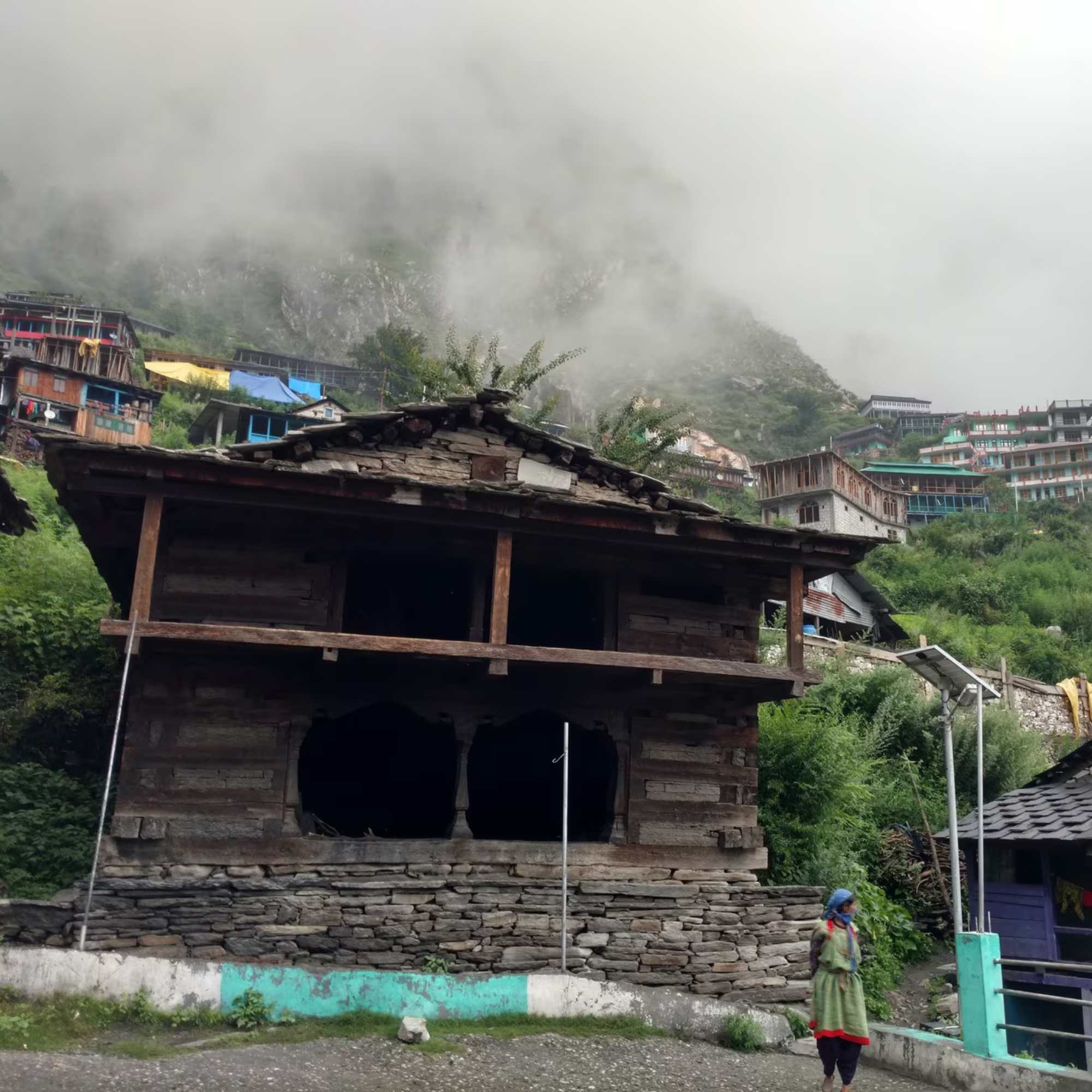 Scenic beauty of Rasol Village surrounded by dense forests, green meadows, and majestic mountains.jpg
